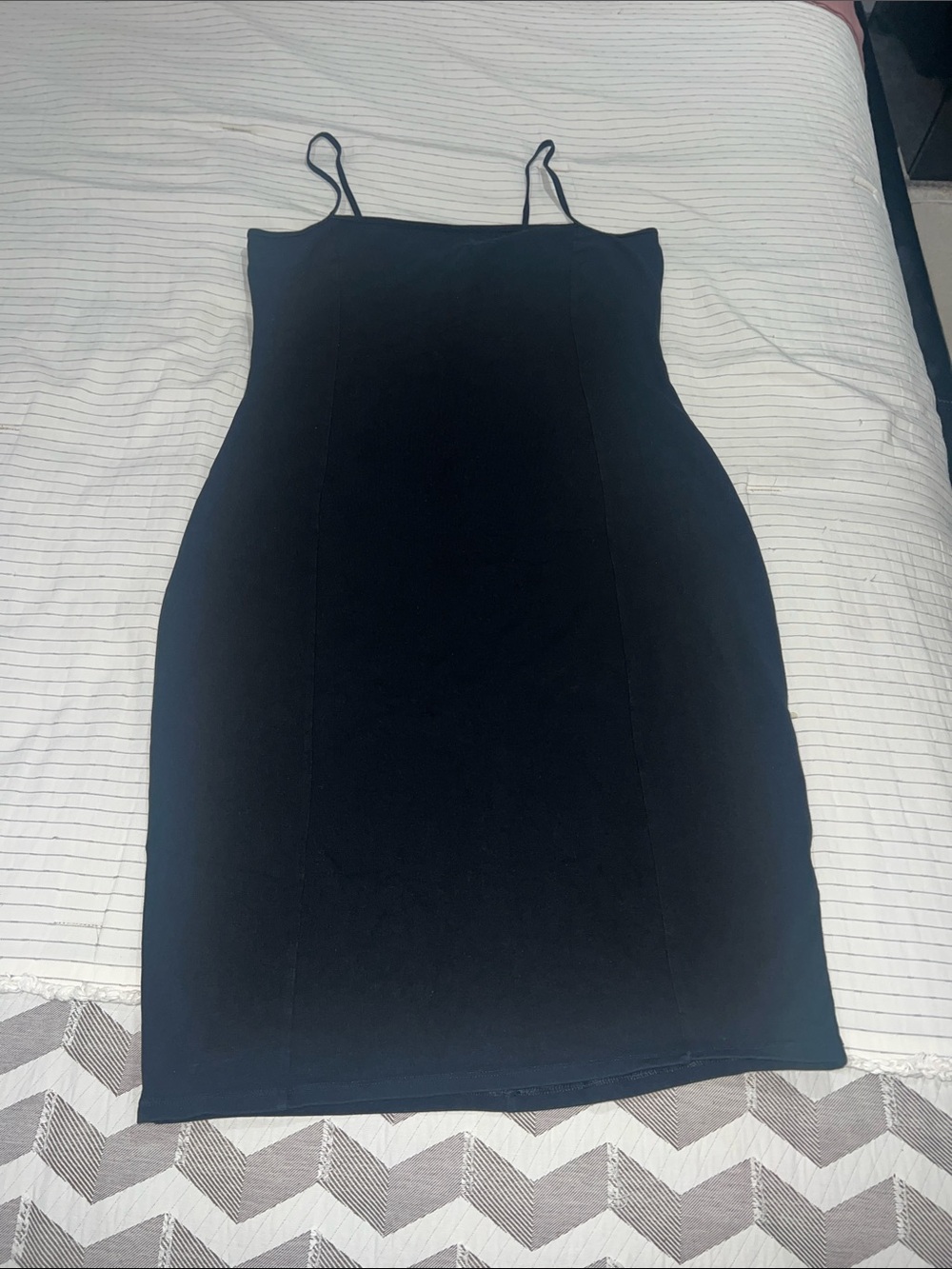 Classic Black Slip Dress with Spaghetti Straps expresses